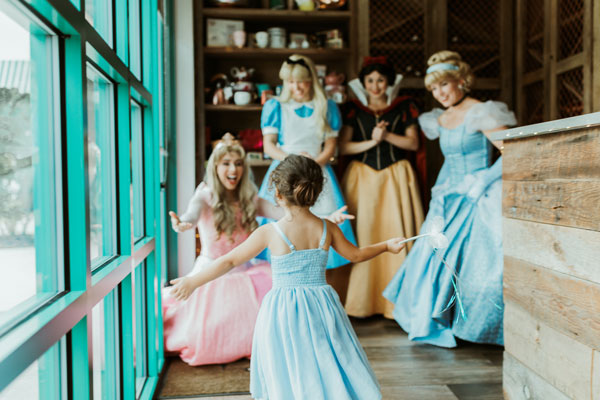 Group of Disney Princess Party Performers Having Tea